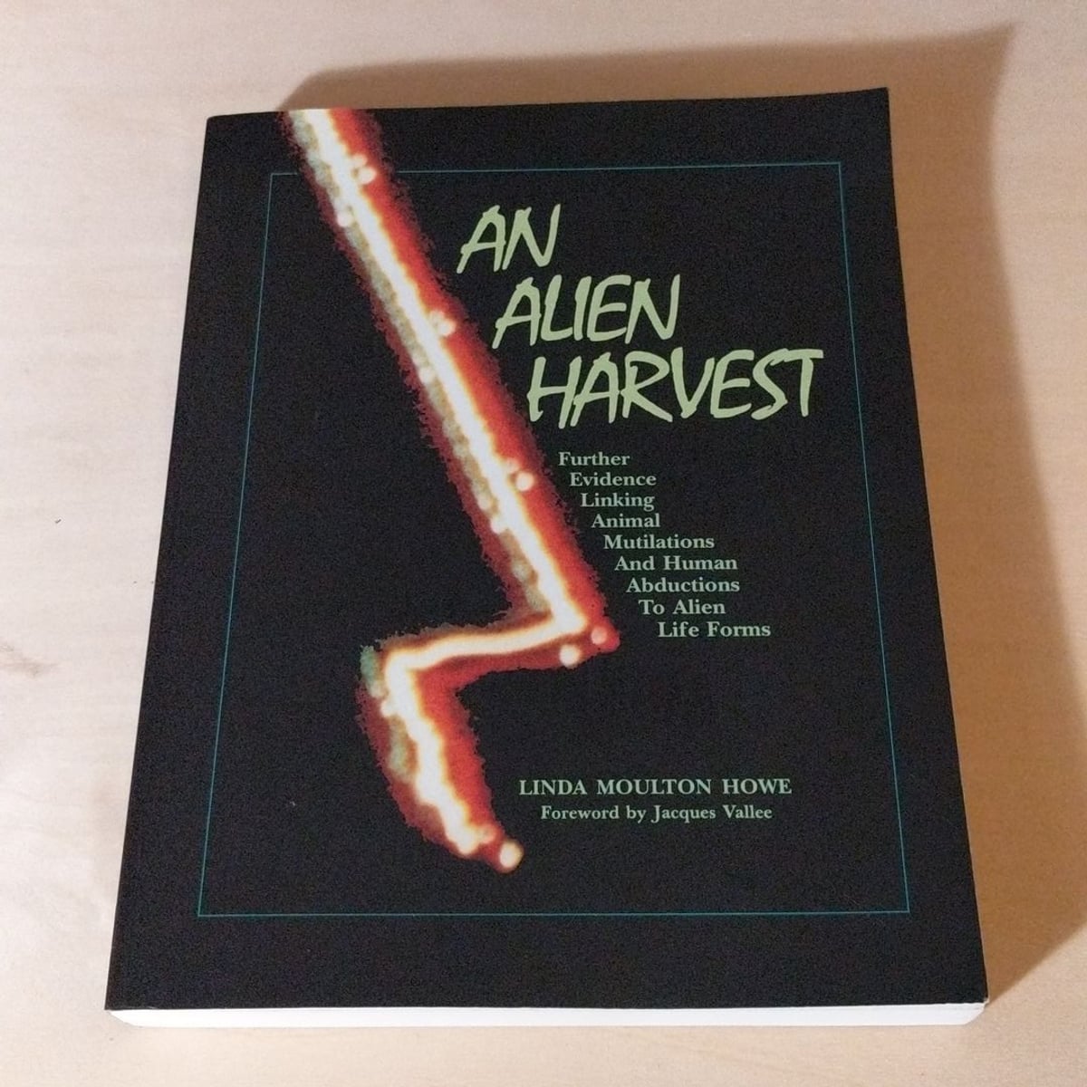 An Alien Harvest by Linda Moulton Howe; Jacques Vallee, Paperback