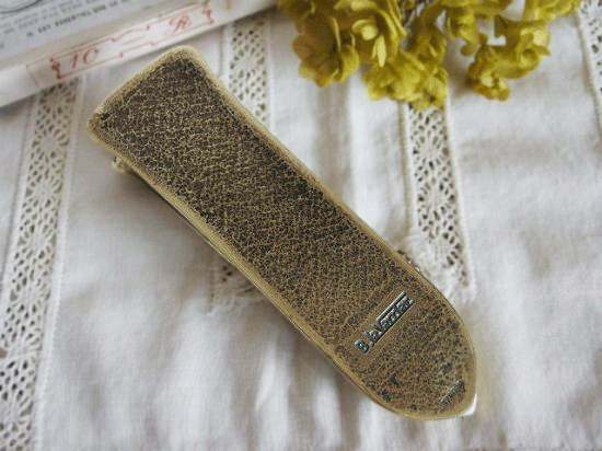 ユリの紋章のアンティーククリップ（ブロンズ製）