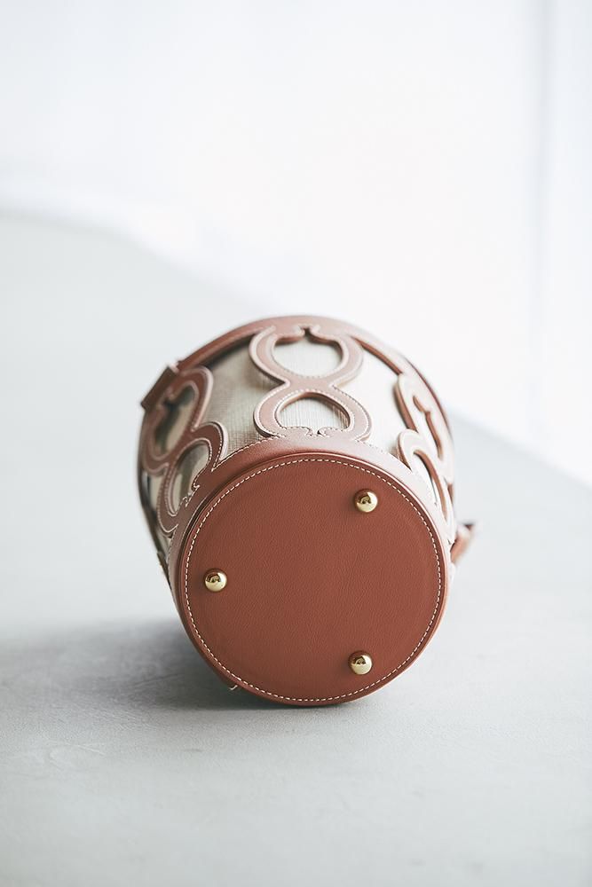 再入荷】カットワークレザーバケットバッグ - seventen