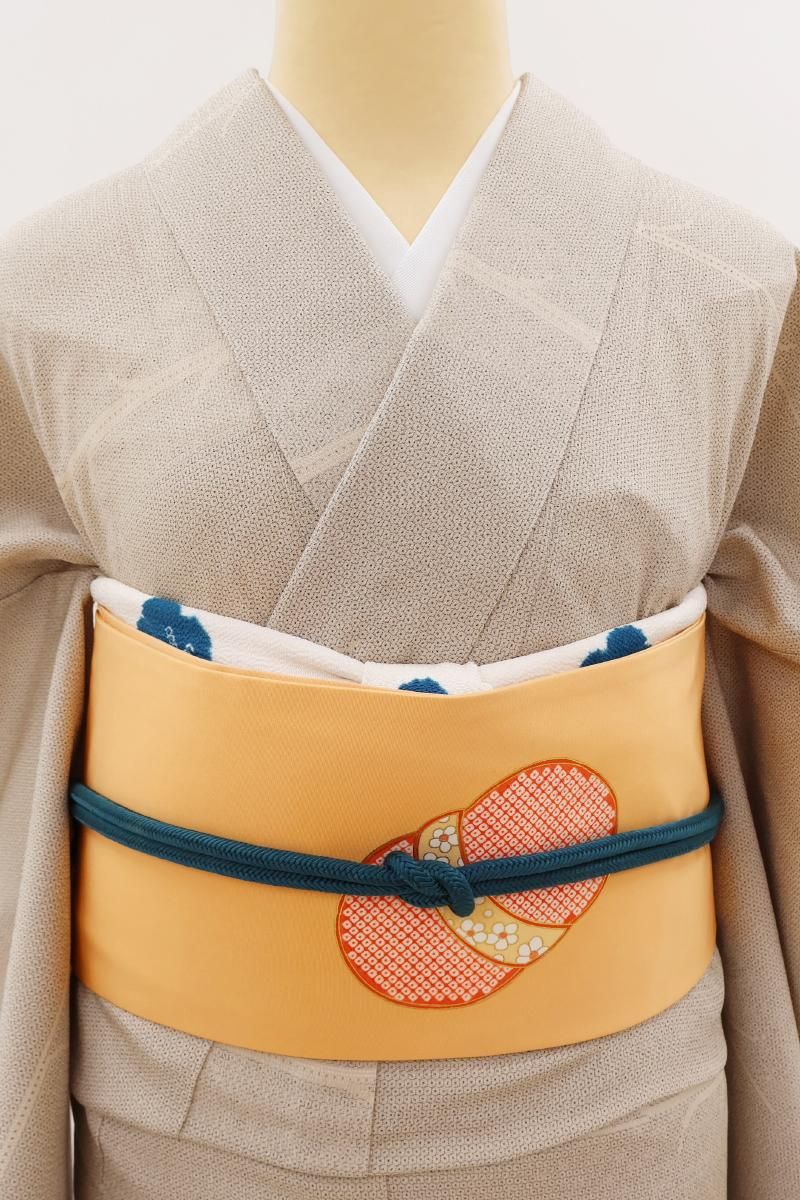 銀座【H-0717】塩瀬地 染名古屋帯 淡い橙色 蹴鞠文 - 銀座きもの青木