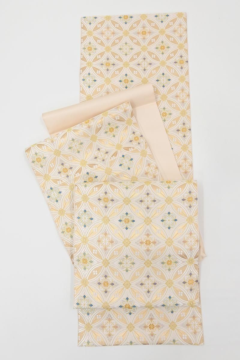 銀座【L-8528】本袋帯 薄香色 七宝繋ぎ花菱文 - 銀座きもの青木｜長く