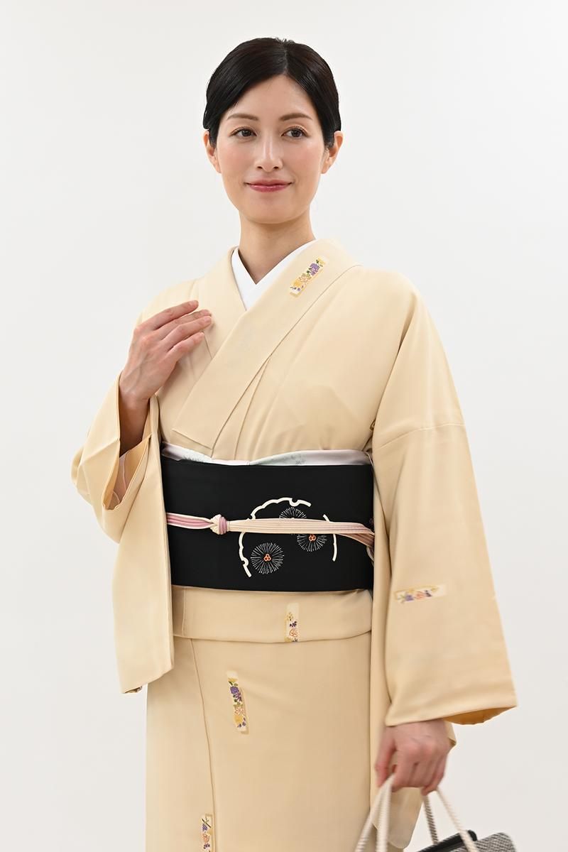 銀座【H-0892】塩瀬地 染名古屋帯 黒色 雪輪に竹や松の図（松屋扱い