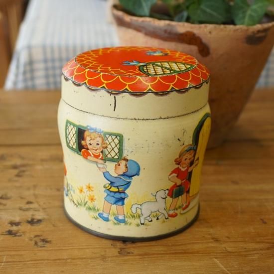 イギリス ヴィンテージ ブリキ缶 THORNS トフィー缶 子供柄 円筒形
