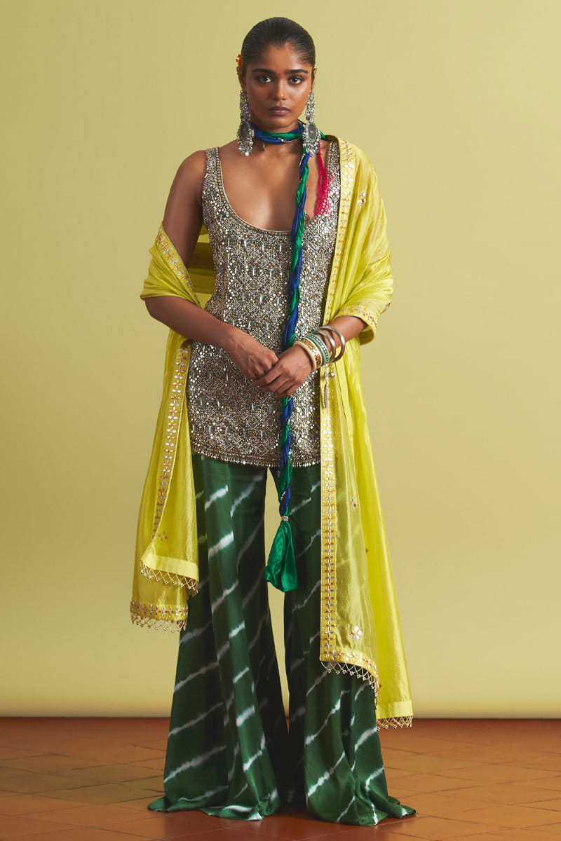 Buy Aubergine embroidered peplum corset by Nikita Mhaisalkar at