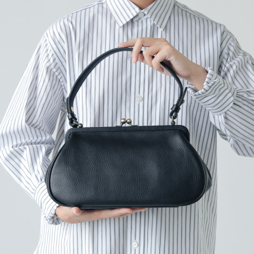 Yammart(ヤマート)カウレザーがま口ラウンド型ハンドバッグ