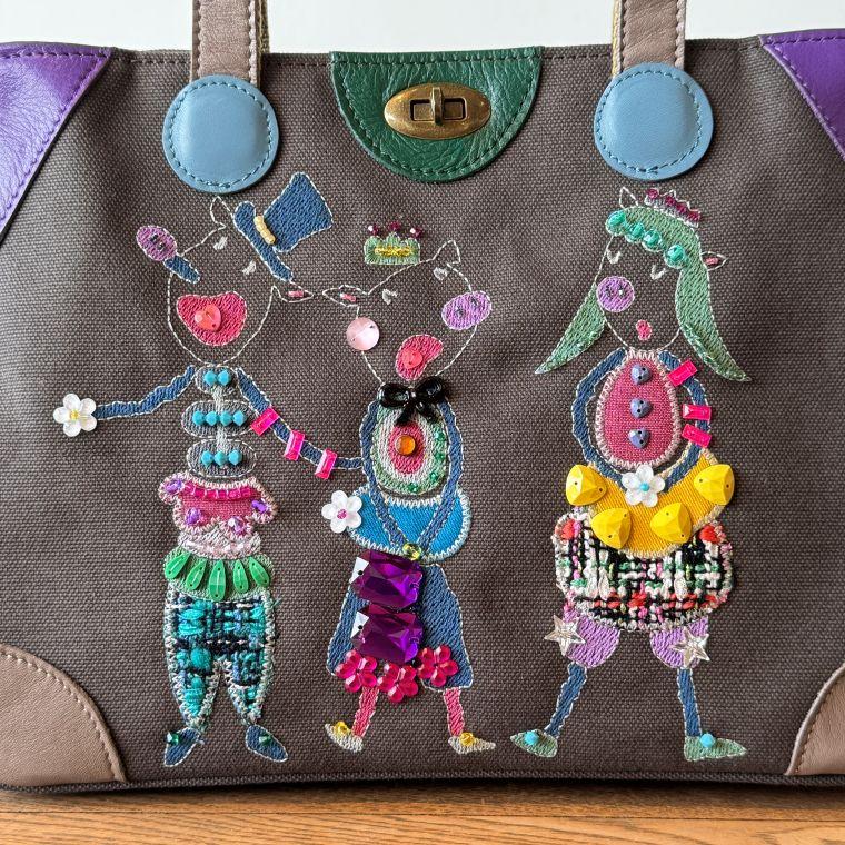 ①アルベルベロ / オレボレブラ フリンジかごバッグ 小ぶり ブタさん