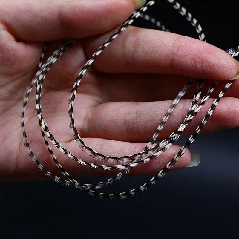 ホットホワイティンググリズリーフライイングサドルハックル20ウイング