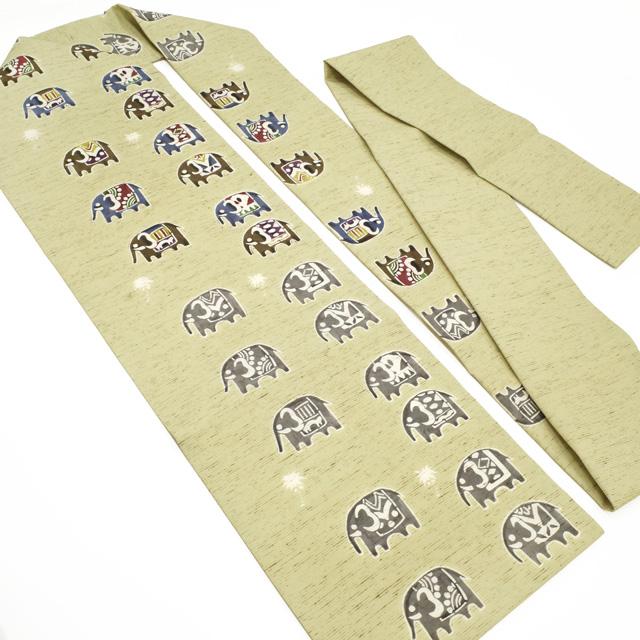 名古屋帯 九寸 正絹 未使用 東京染 紅型染 木蘭色 ぜんまい紬 象 ヤシ