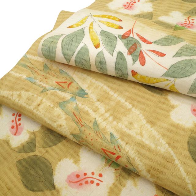 名古屋帯 九寸 鈴木紀絵 型絵染 絞り 紬 正絹 全通 手染め 黄茶地 花