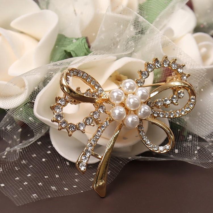 ブローチ おしゃれ リボンデザインパール 結婚式 入学式 卒業式