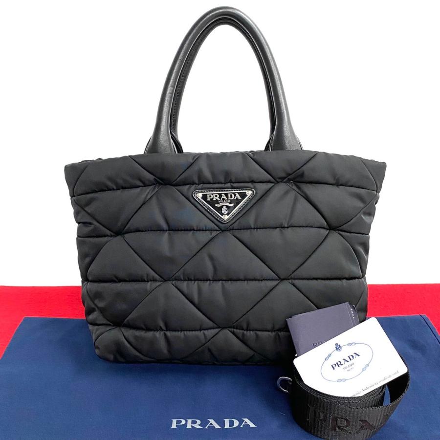 PRADA（プラダ） ほぼ未使用 希少品 三角ロゴ 金具 ナイロン レザー 本
