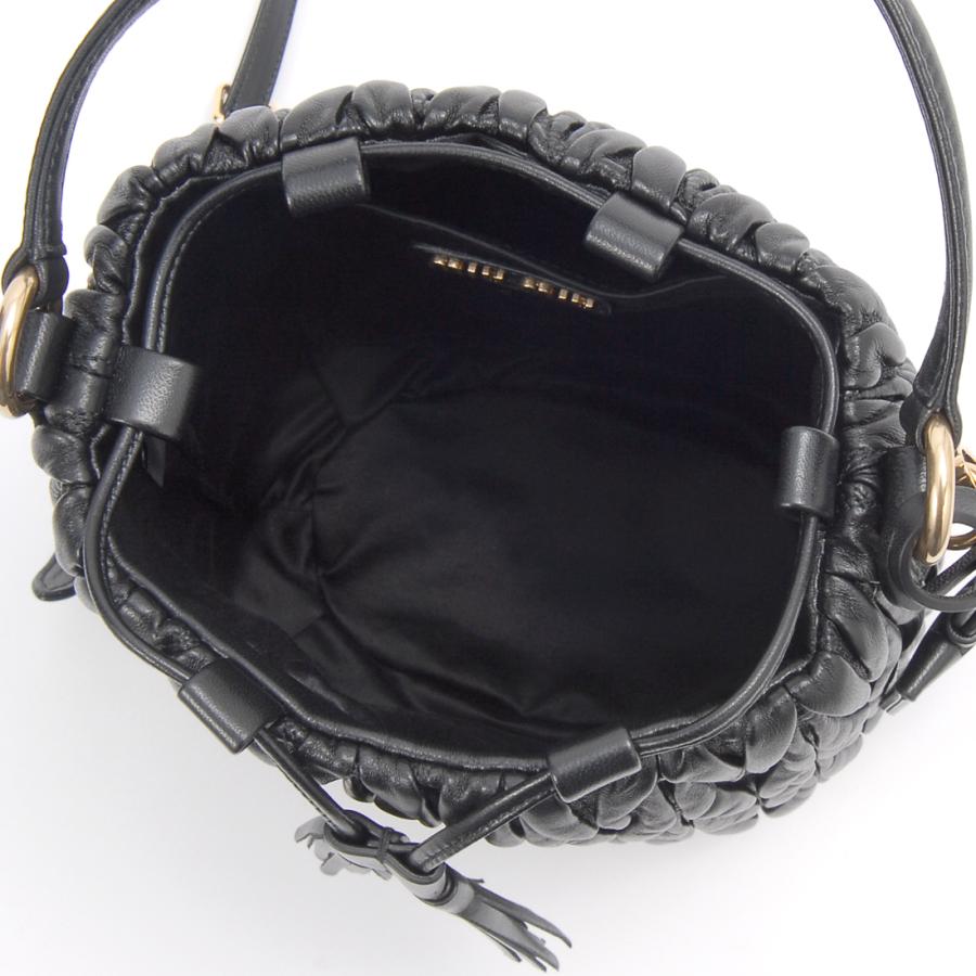 訳あり 正面ロゴ部分に錆汚れ、保護袋に汚れあり MIU MIU ミュウミュウ