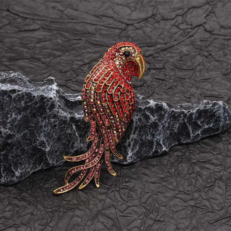 ブローチ 鳥 インコ オウム ワシ 鷲 黒 赤 ラインストーン レディース