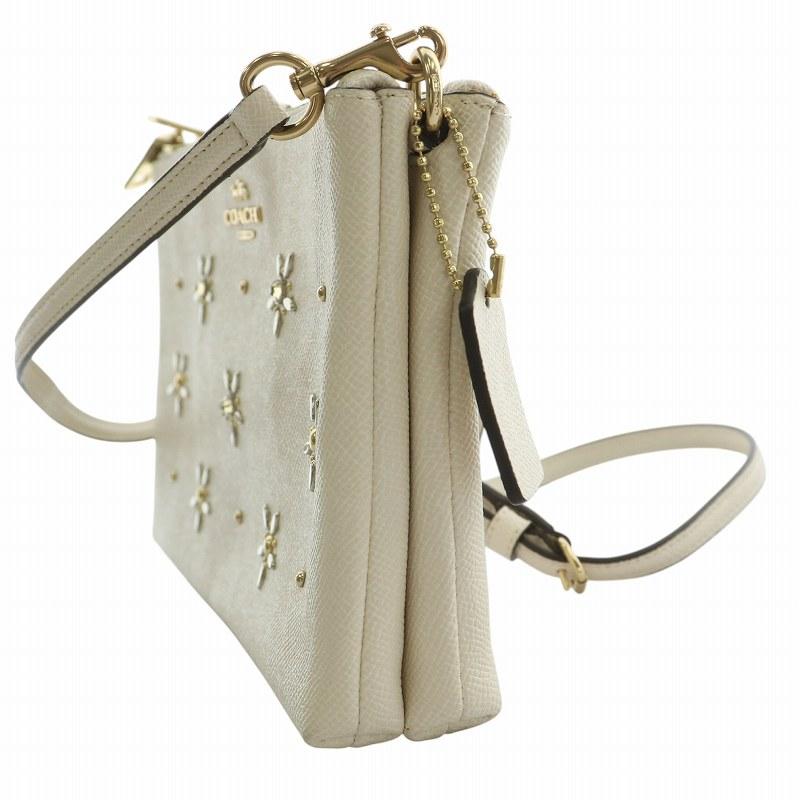 COACH（コーチ） フラワーモチーフ ショルダーバッグ スタッズ ライン