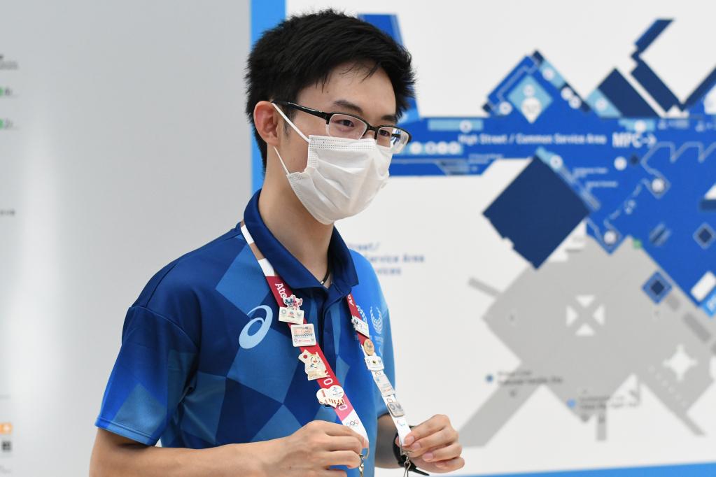 ピンバッジをコレクションする東京五輪の中国人ボランティア--人民網