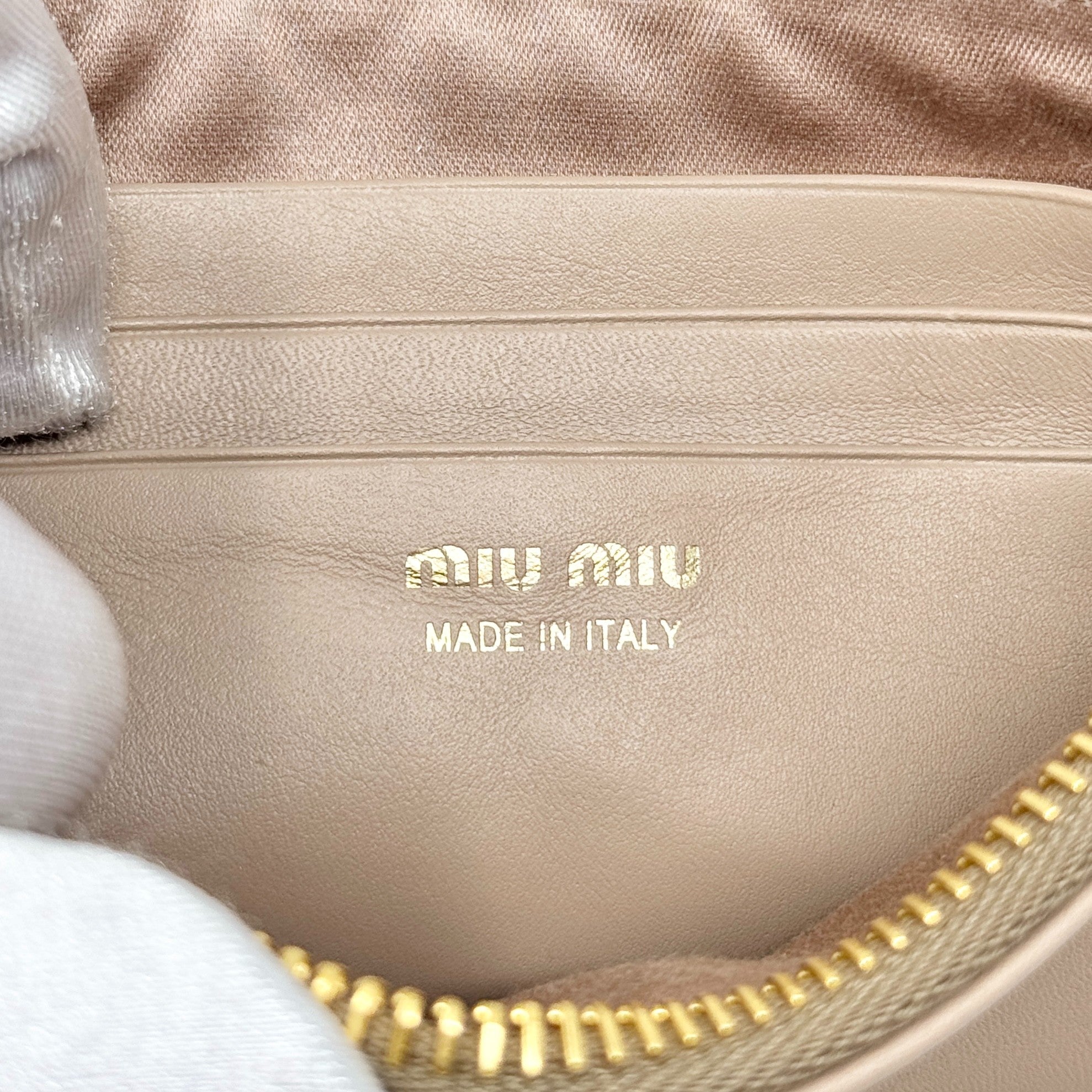 Miu Miu Beige Logo Zip Pouch | Jadore Couture