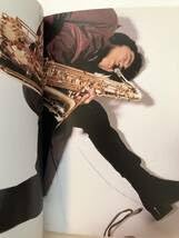 Amazon.co.jp: モータードライヴ 平間至写真集 90年代を代表する81人の