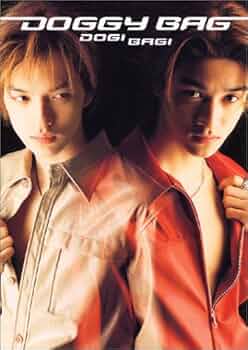 Amazon.co.jp: DOGGY BAG写真集-DOGI BAGI : 本