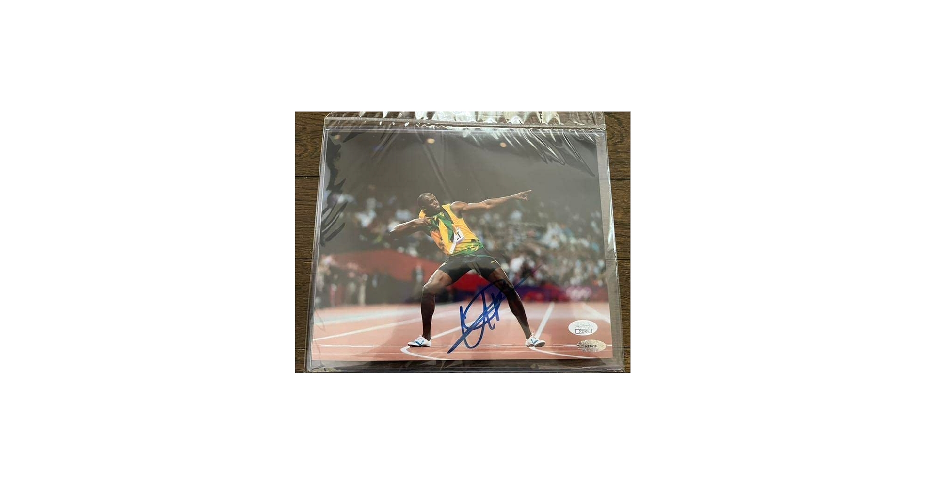 Amazon.co.jp: 人類史上最速 ウサインボルト 直筆サイン 鑑定書付き
