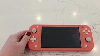 Amazon.com: Nintendo Switch Lite - Coral - Switch (Renewed