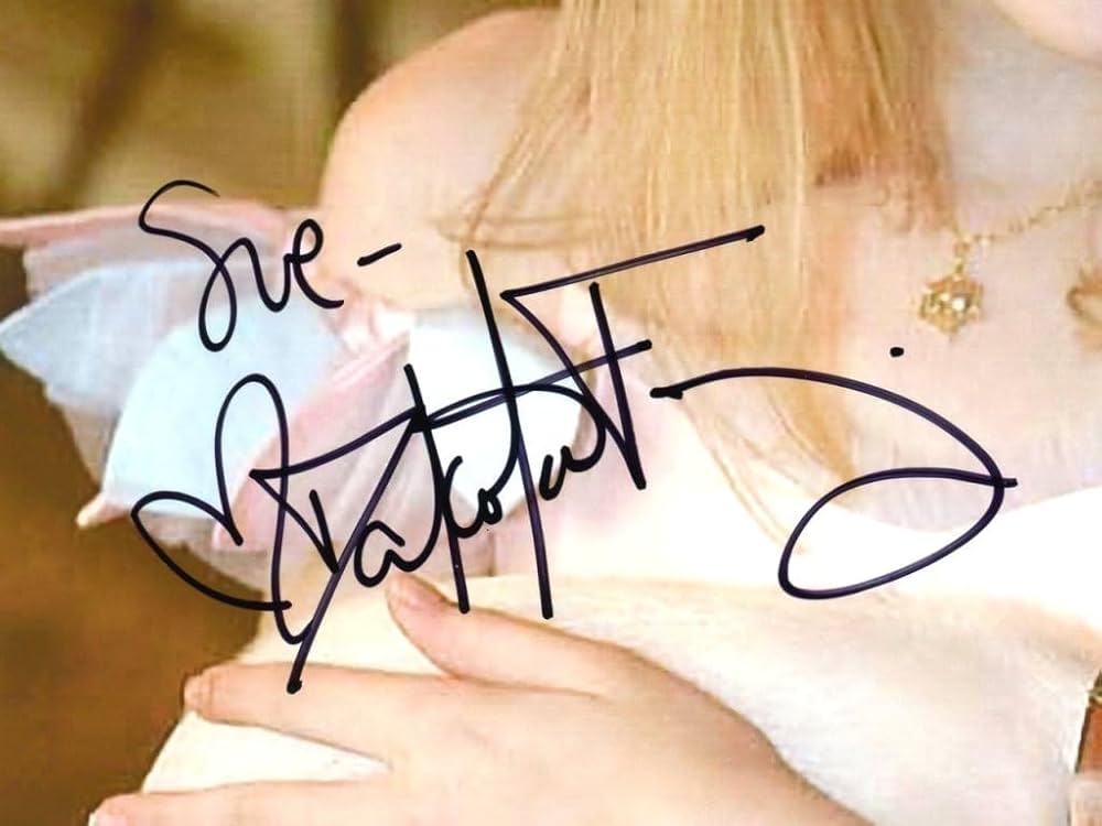 ダコタ・ファニング 直筆サイン入り写真2枚 保証書付き(オマケ付き