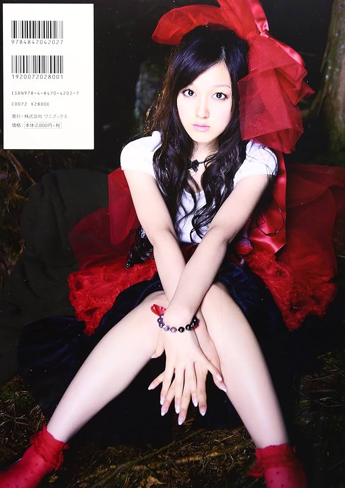 Amazon.co.jp: 久住小春写真集『Sugar Doll』(DVD付) : 西田 幸樹: 本