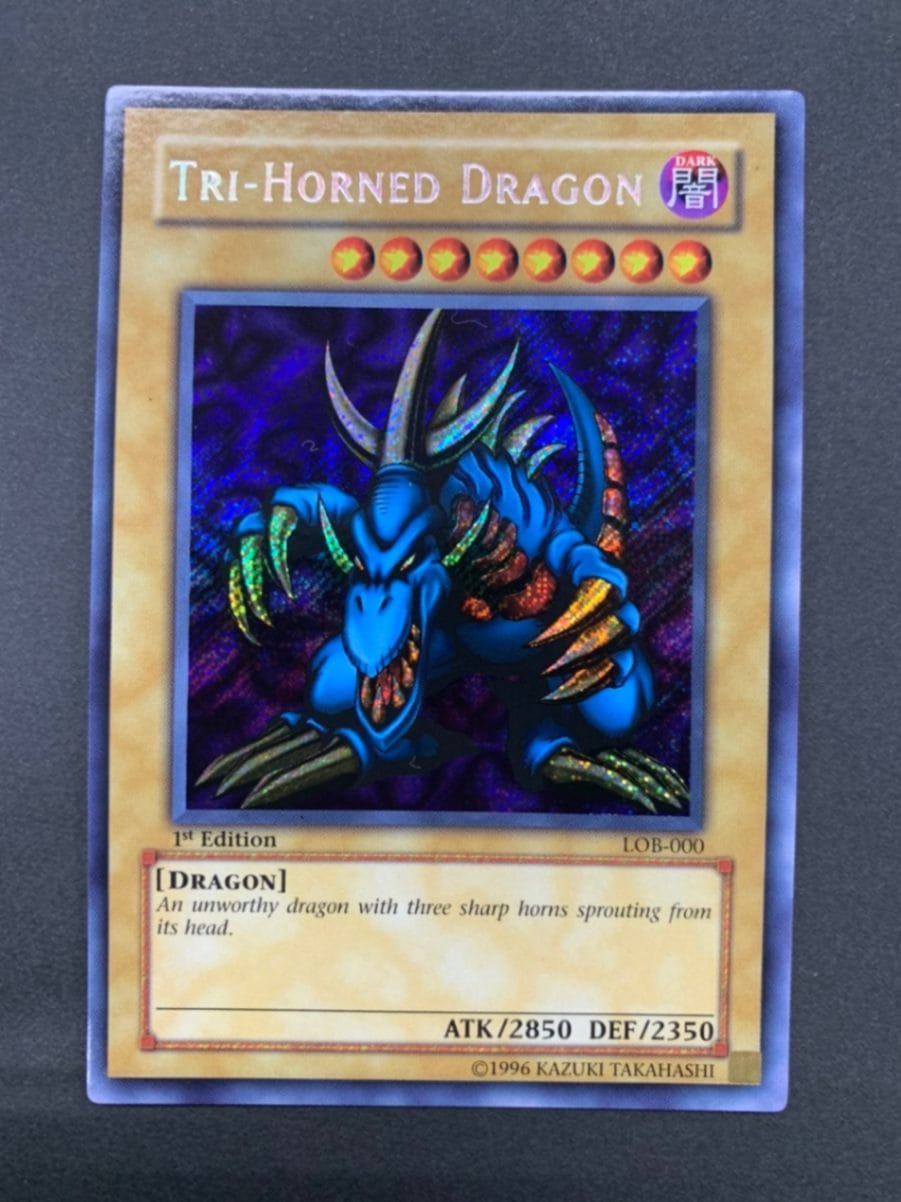 TRI-HORNED DRAGON /トライホーン・ドラゴン[旧ｱｼﾞｱｼｰｸﾚｯﾄ]《1st》(LOB