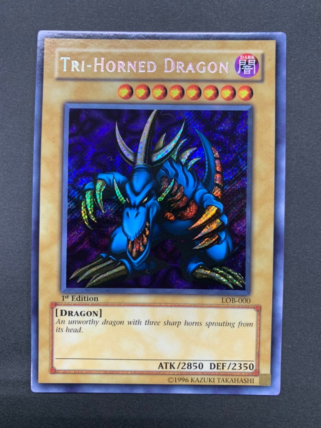 TRI-HORNED DRAGON /トライホーン・ドラゴン[旧ｱｼﾞｱｼｰｸﾚｯﾄ]《1st》(LOB