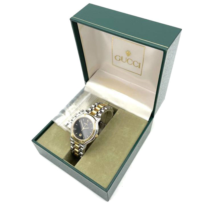 GUCCI グッチ レディース腕時計 クオーツ デイト シルバー ゴールド