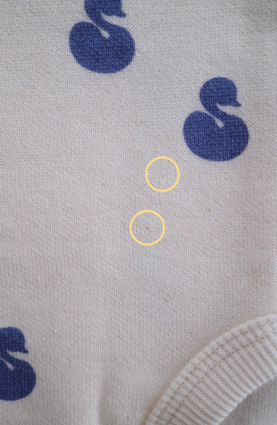 SWAN COVERALL – melted butter