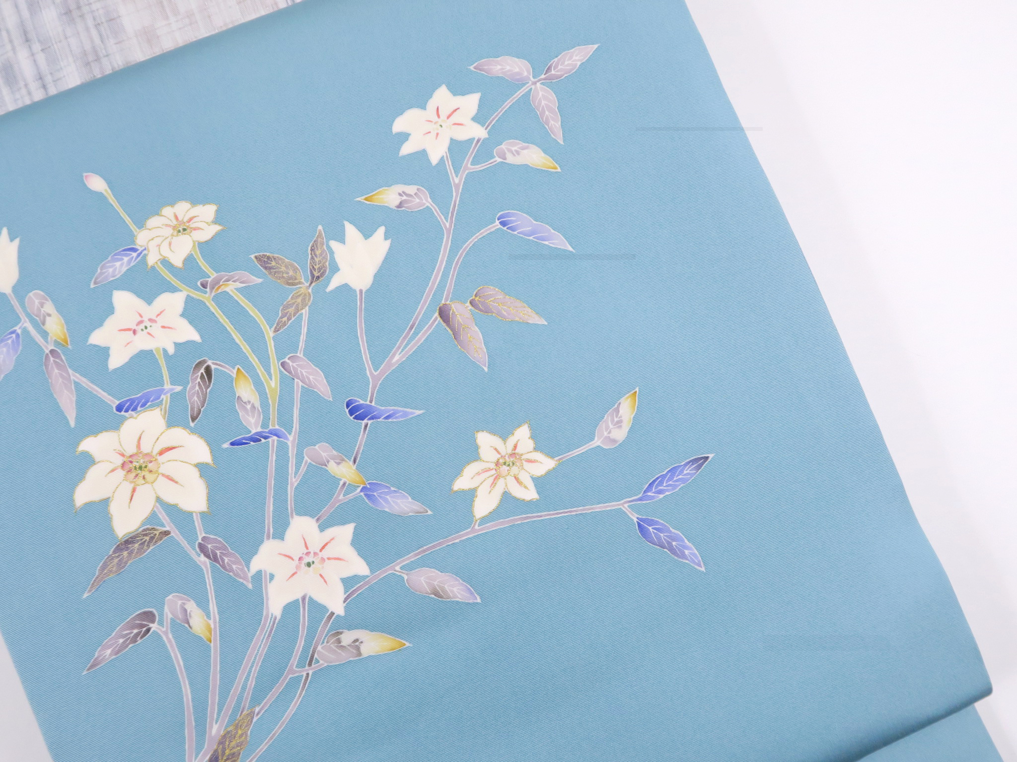 綺麗なブルーに白の花柄 塩瀬名古屋帯 | たまるや七草着物店