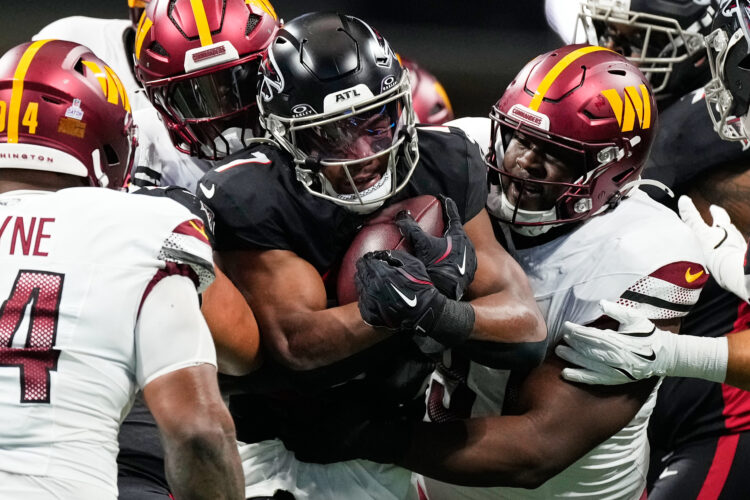 Bijan Robinson surpassing Christian McCaffrey as top dual-threat