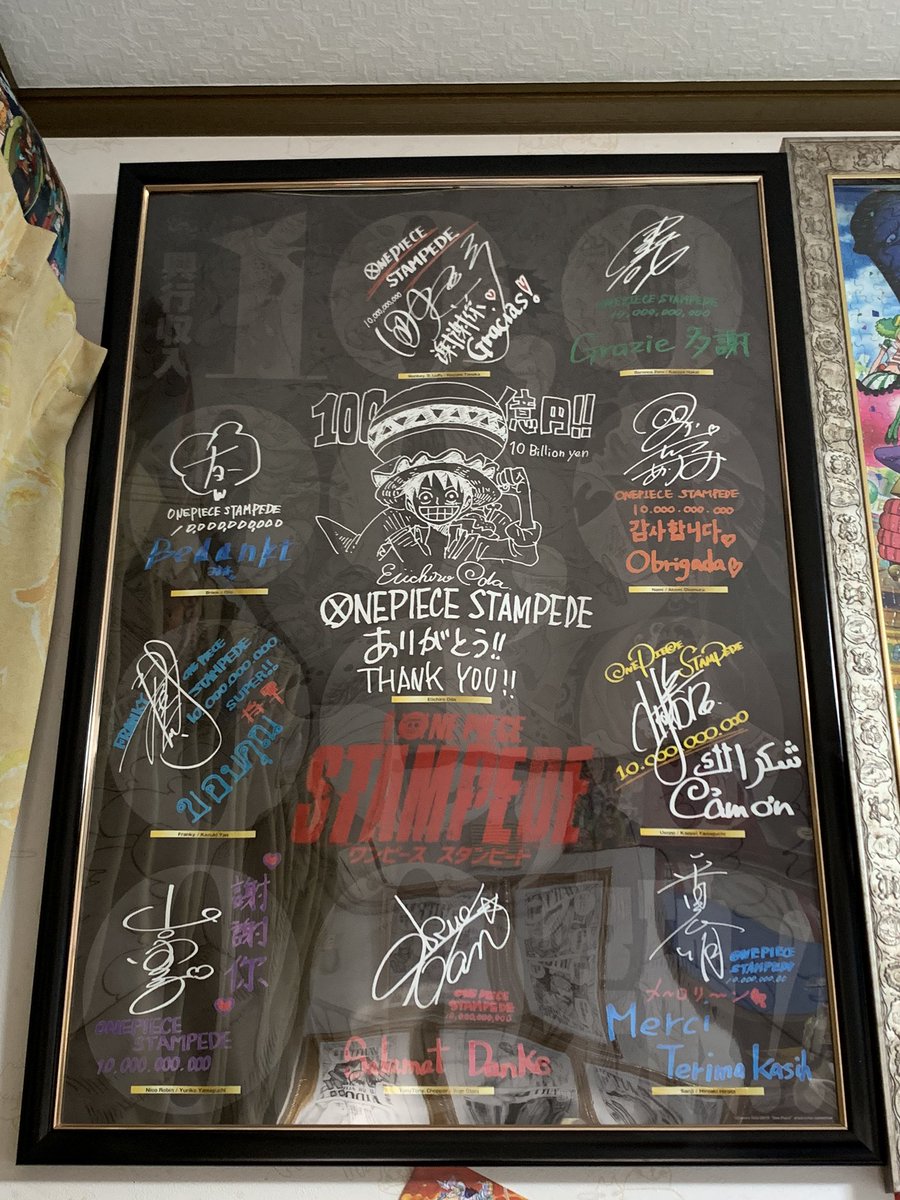 額縁が届いたので、「尾田先生&麦わらの一味声優陣寄せ書きポスター