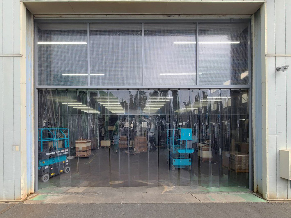 印刷工場に防音・防塵・空調用ビニールカーテン | 業務用ビニール