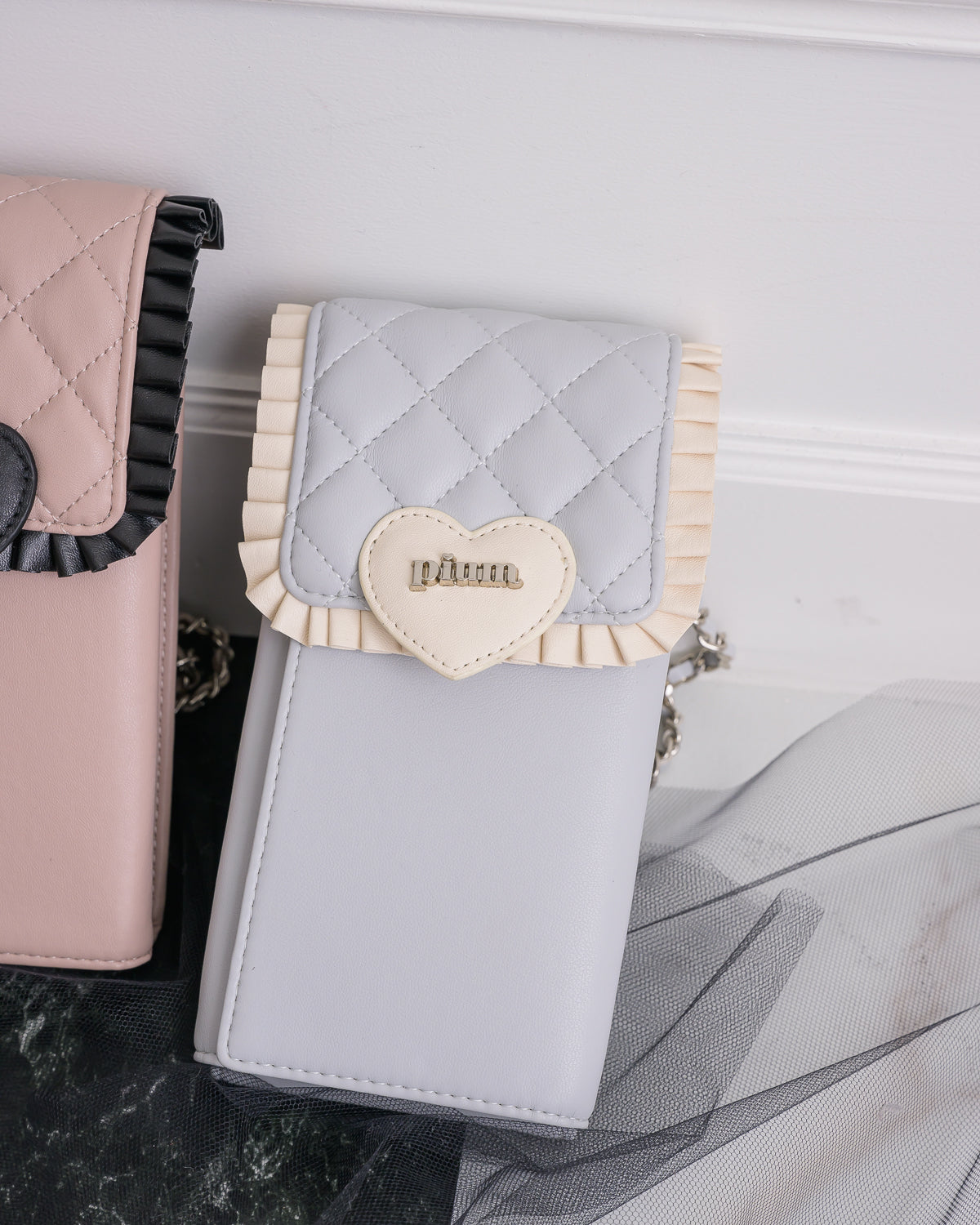 piumハートキルティングフォンホルダー