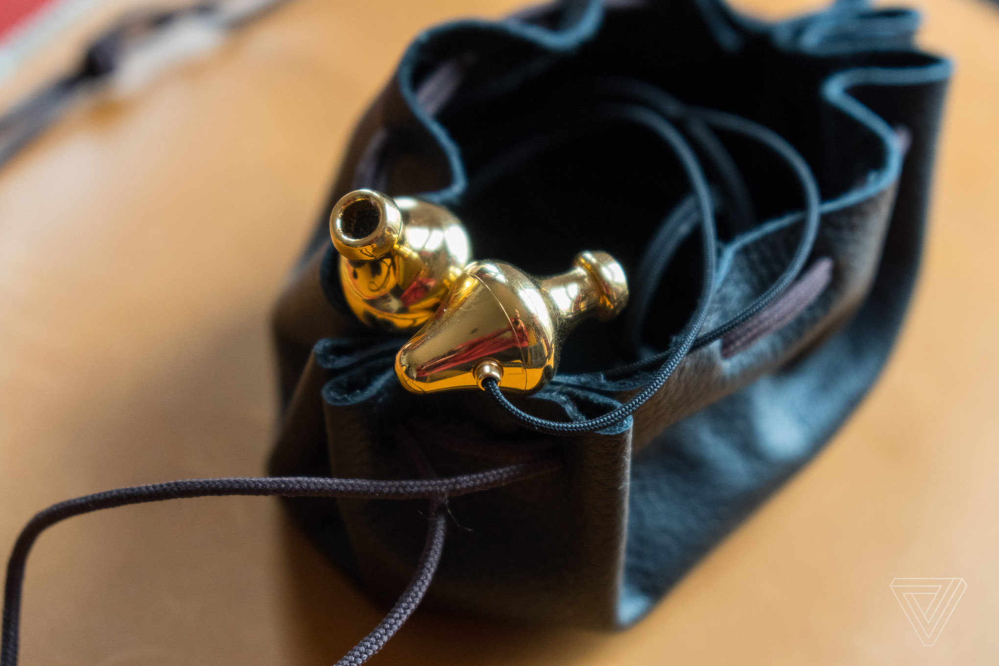 These golden headphones were crafted by a mad genius | The Verge