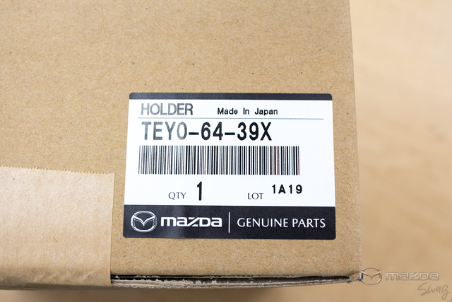 TEY0-64-39X - Cup Holder - 2012-2015 Mazda CX-9 | mazdaswag.com