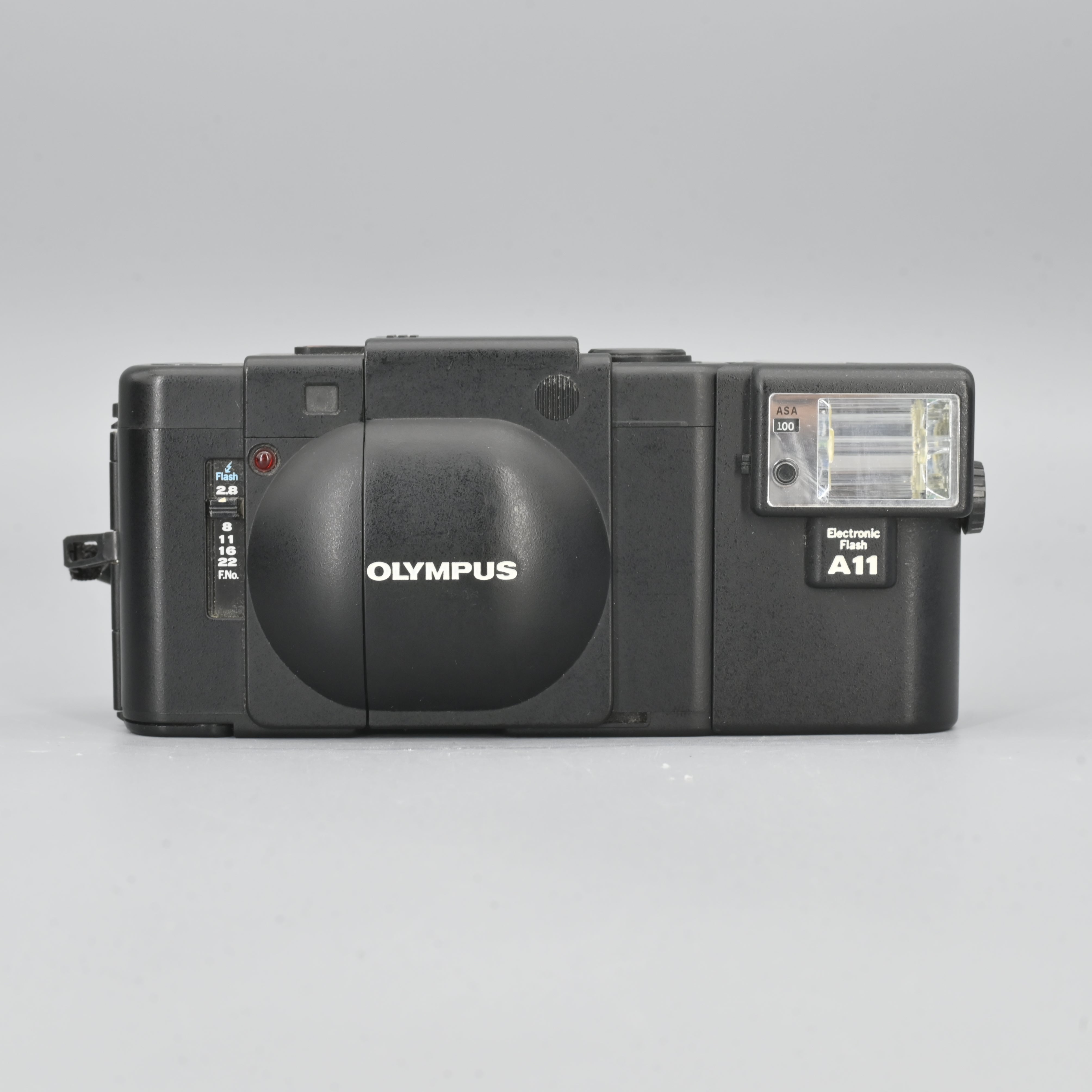 Olympus XA + A11 Flash. – SHOWA