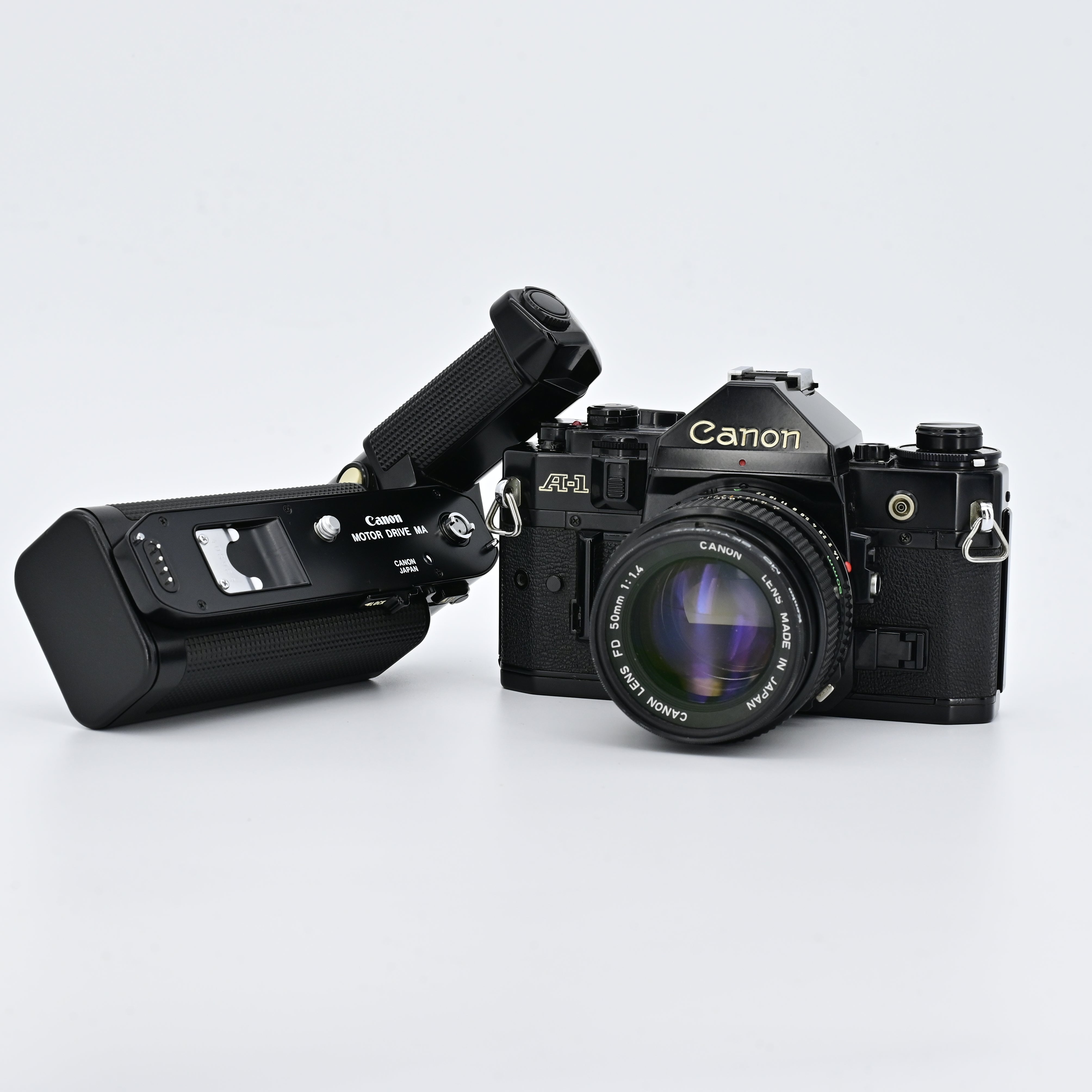 Canon A1 Black + FD 50mm F1.4 Lens – SHOWA