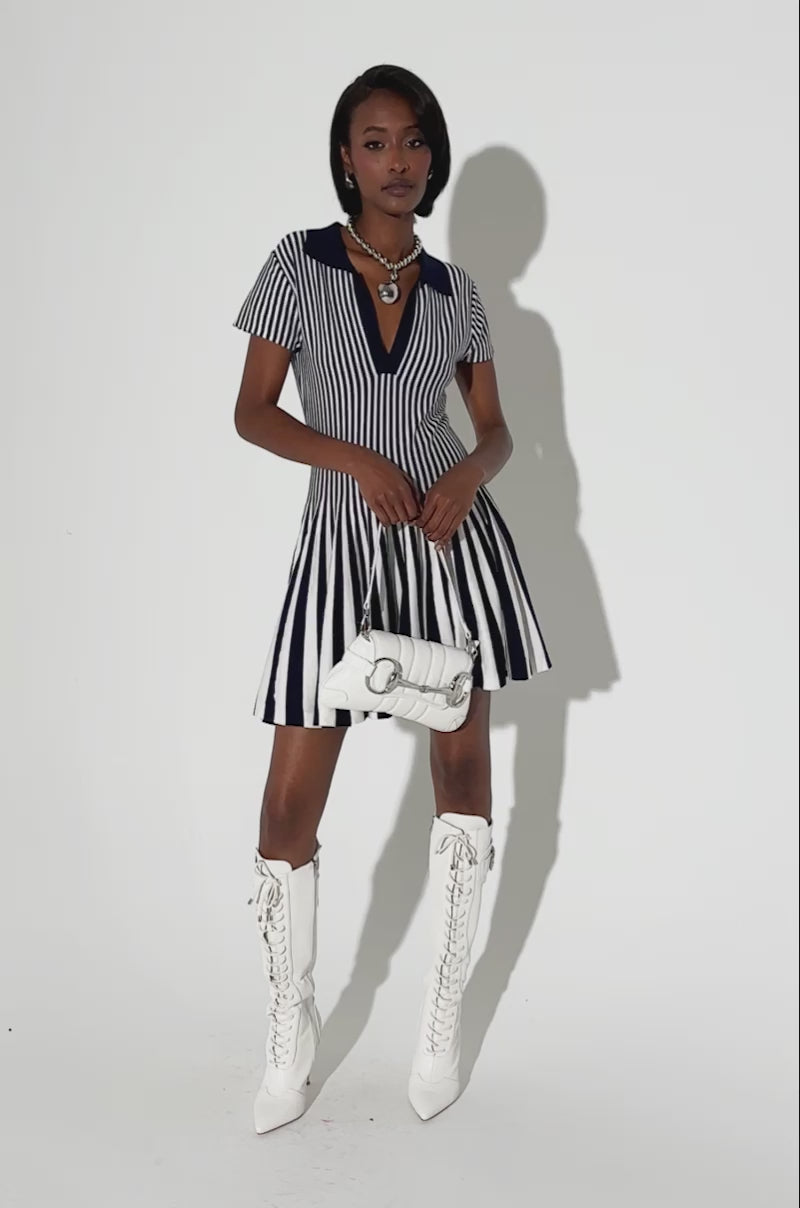 ALINA PLEATED KNIT FIT AND FLARE MINI DRESS IN NAVY – AKIRA