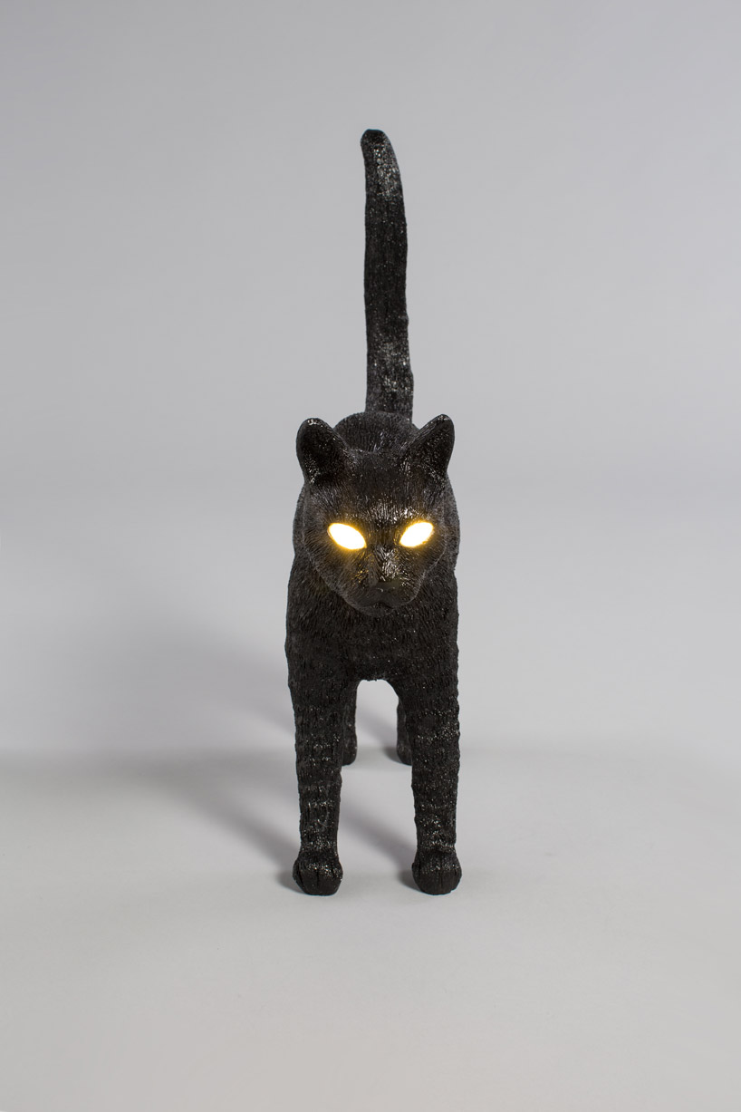 studio job's cat-shaped lamp for seletti has eyes that light up