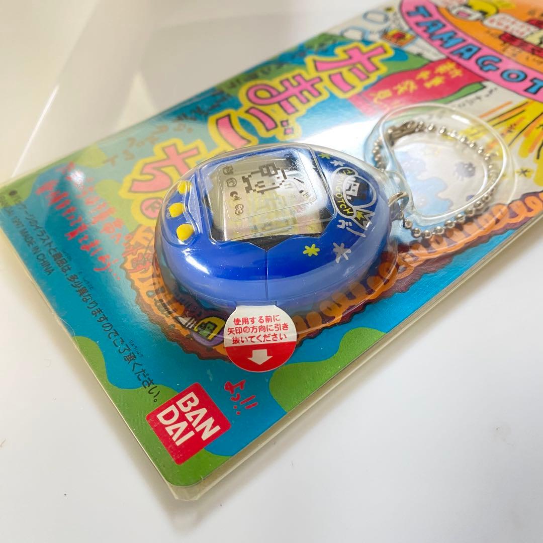 新種発見!! たまごっち 紺色 動作確認済み - メルカリ