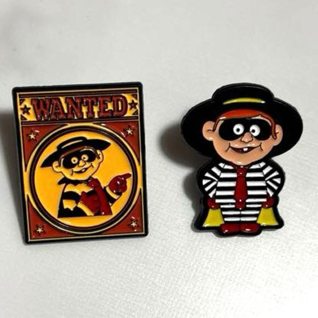 マクドナルドの「ハンバーグラー」Wantedポスターピンバッジ - メルカリ