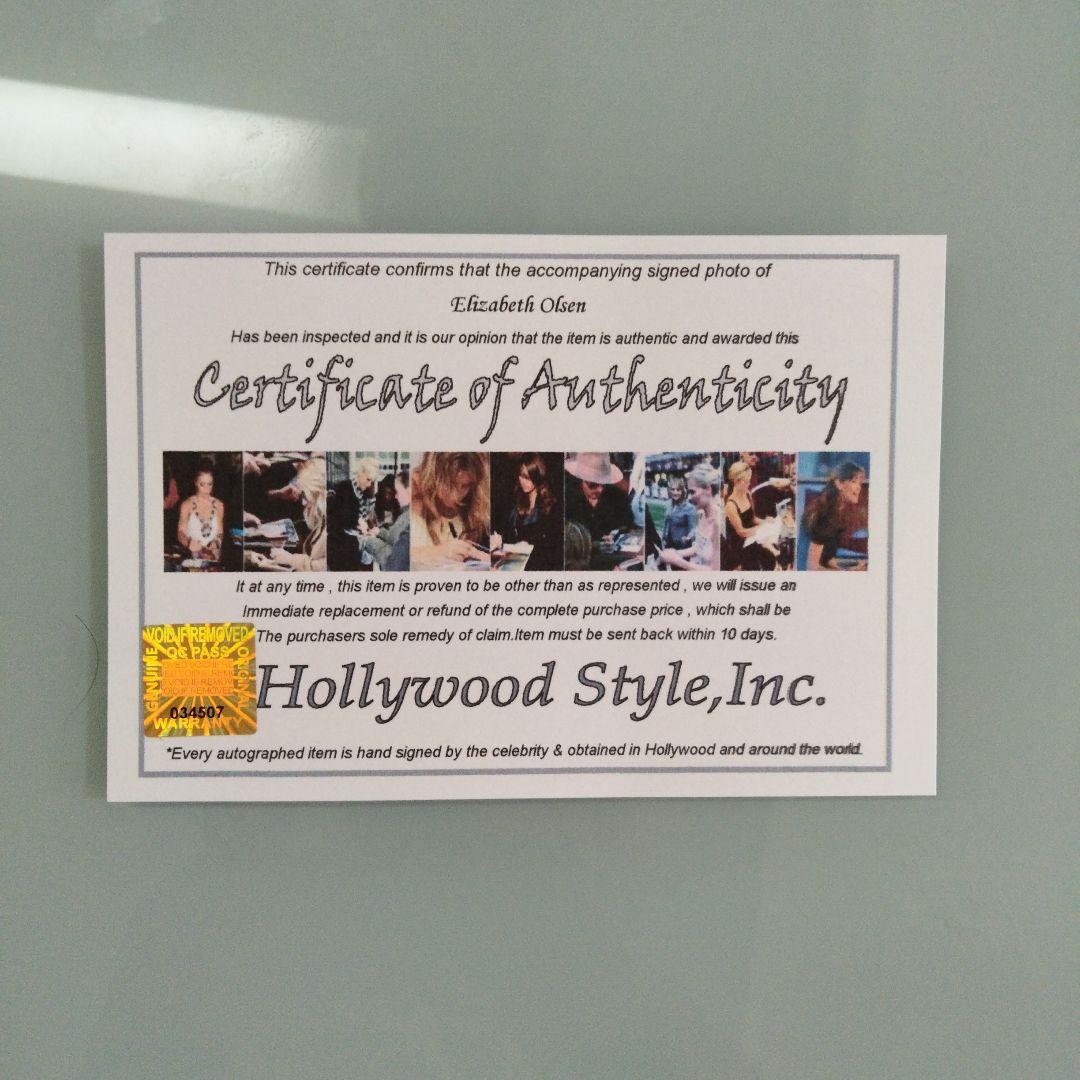 セール中…エリザベス・オルセン直筆サイン入り超大型写真 - メルカリ