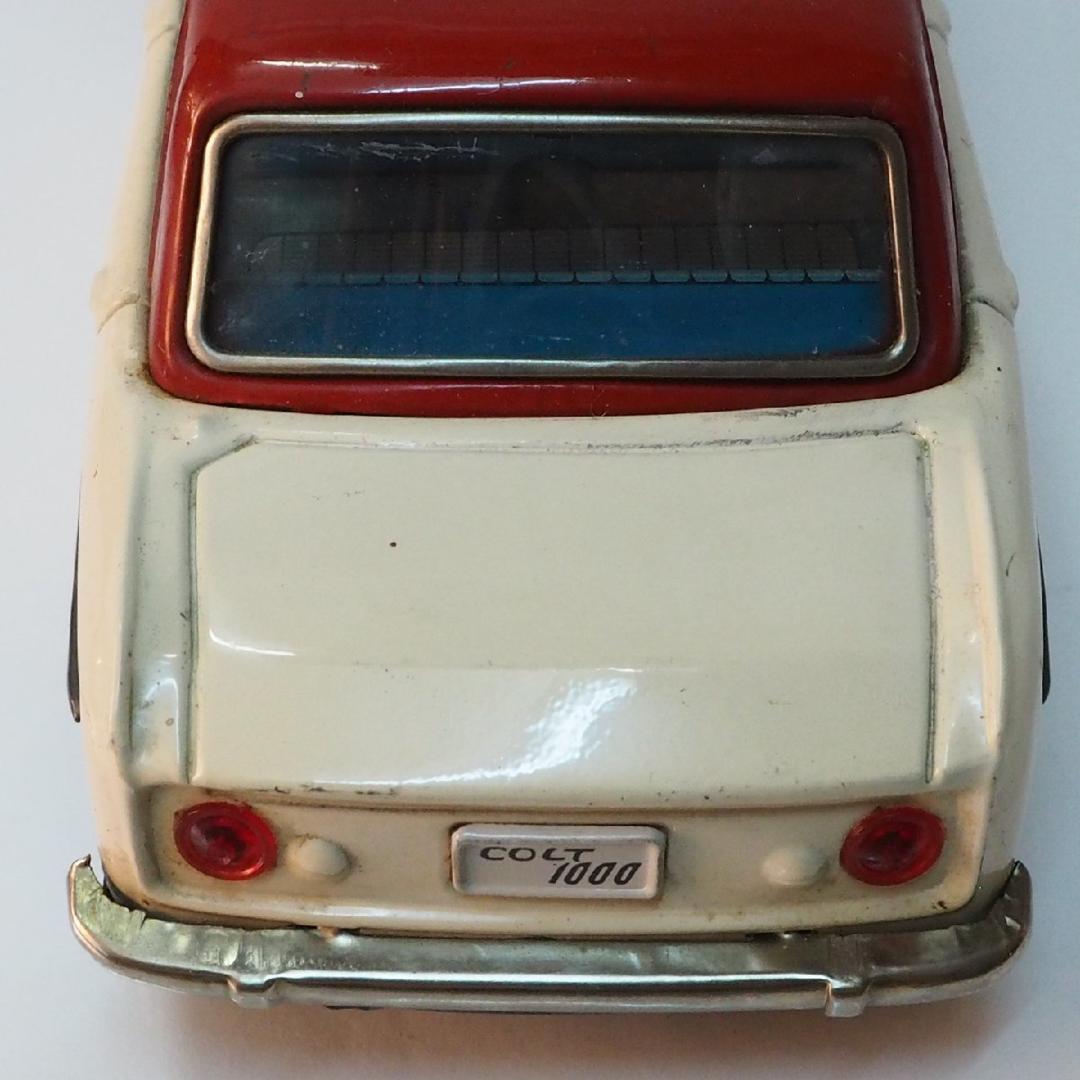 萬代屋【三菱コルト 1000 赤白 ミラー欠】フリクション ブリキTIN【箱無】
