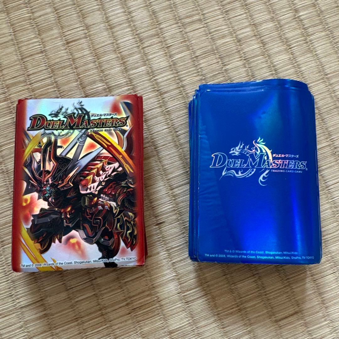 デュエマ】旧公式スリーブ2つセット - メルカリ