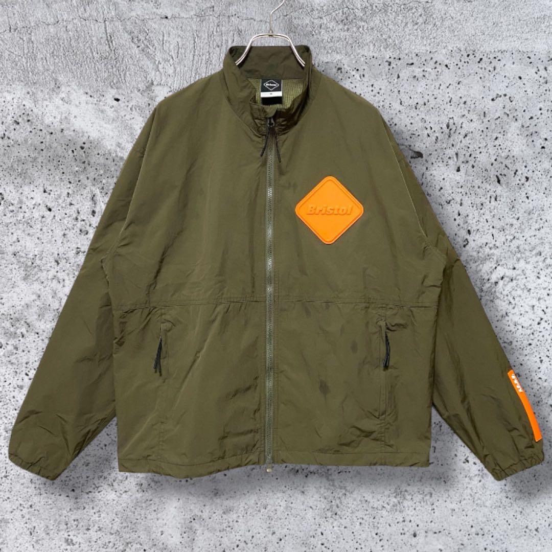 入手困難】F.C. Real Bristol ナイロンジャケット カーキ M - メルカリ