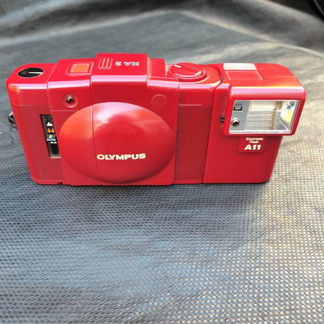 OLYMPUS オリンパス フィルムカメラ XA2 レッド 簡易動作確認済 オリンパス OLYMPUS XA2 動作確認済み - メルカリ