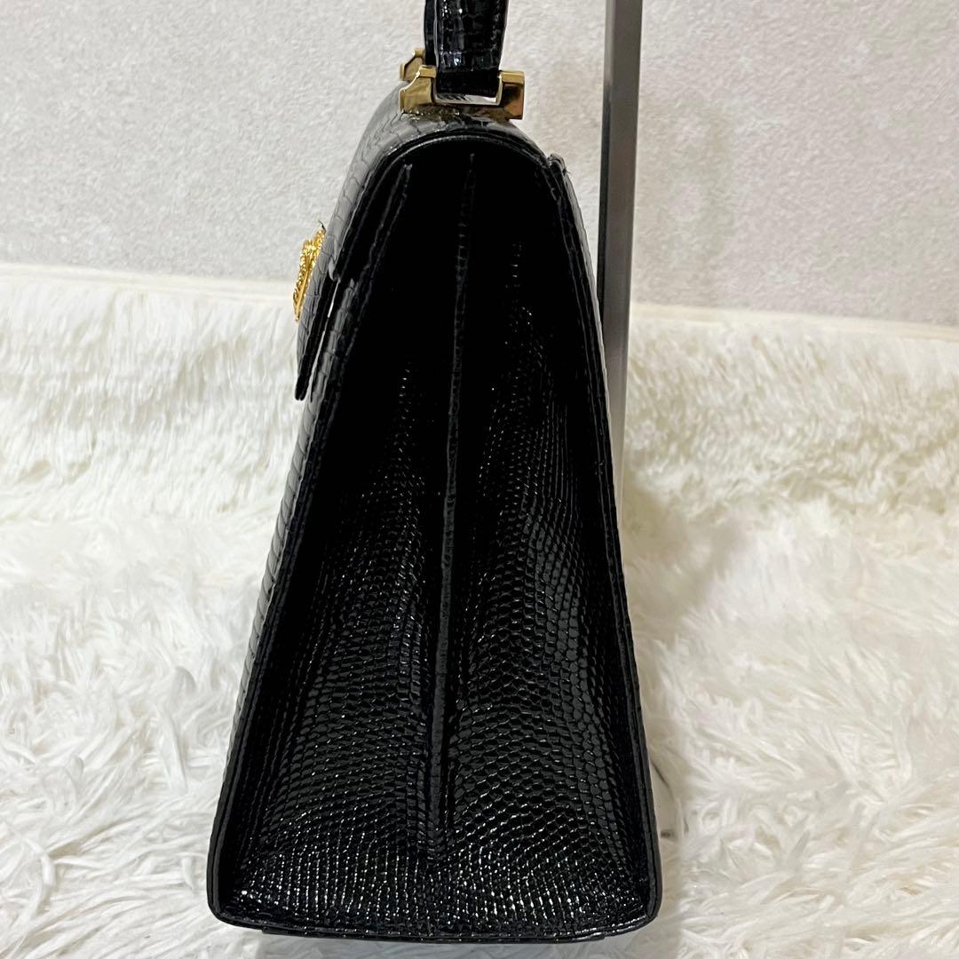 リザード型押し フォーマル ハンドバッグ 黒 ゴールド金具 自立 - メルカリ