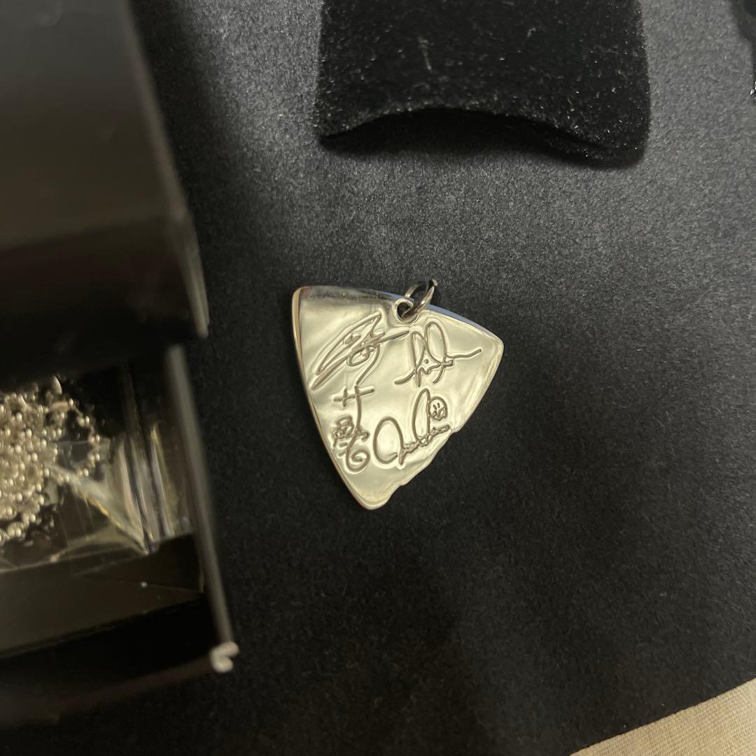 Alexandros ピック型 ネックレス - メルカリ
